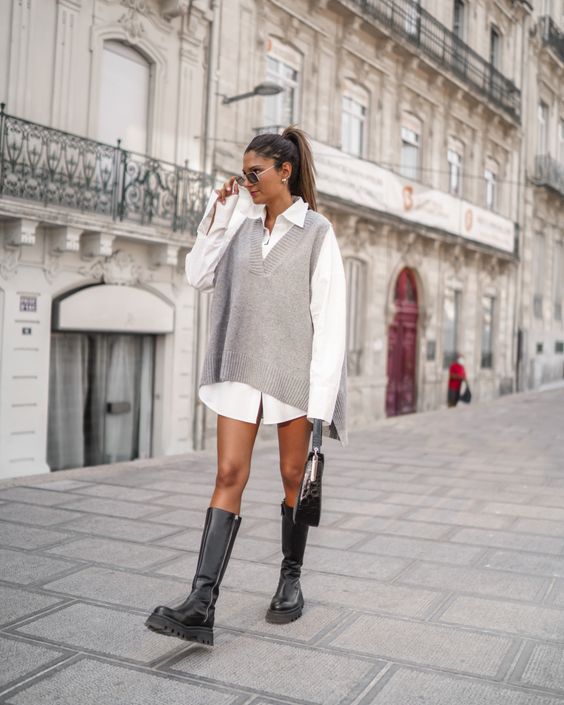a white shirtdress, a grey oversized sweater vest, black chunky boots, a black bag are all you need for a fall outfit