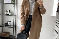 34 an everyday outfit with a grey hoodie, leather leggings, boots, a tan midi coat, a black bag for the fall