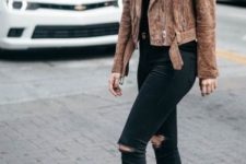 With black distressed skinny jeans and black leather pumps