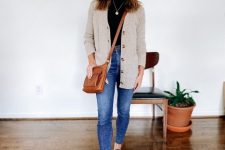 With blue skinny cropped jeans, golden necklace, brown leather crossbody bag and black leather flat shoes
