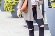 With distressed skinny jeans, brown leather belt, brown leather tote bag and brown suede low heeled boots