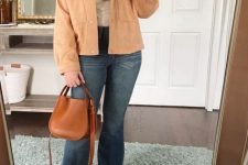 With flare jeans, brown leather mini bag and beige suede boots