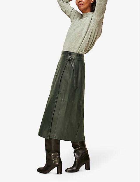 With light green shirt and dark brown leather heeled high boots