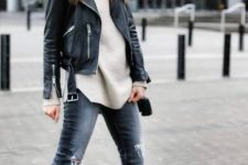 With oversized sunglasses, navy blue distressed skinny jeans and brown suede high heeled ankle boots