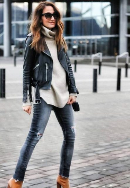 With oversized sunglasses, navy blue distressed skinny jeans and brown suede high heeled ankle boots