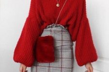 With red loose bell sleeved sweater, necklace and gray and red checked high-waisted mini skirt