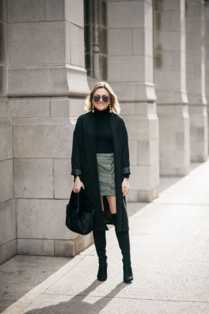 With sunglasses, golden earrings, gray high-waisted button front mini skirt, black faux fur bag and black over the knee boots