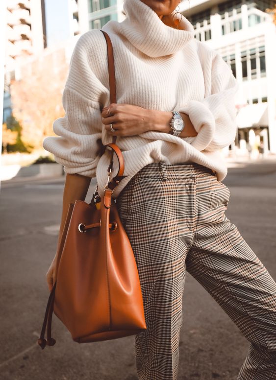 a creamy oversized sweater, grey plaid pants, an amber leather bag and a chic watch for the fall