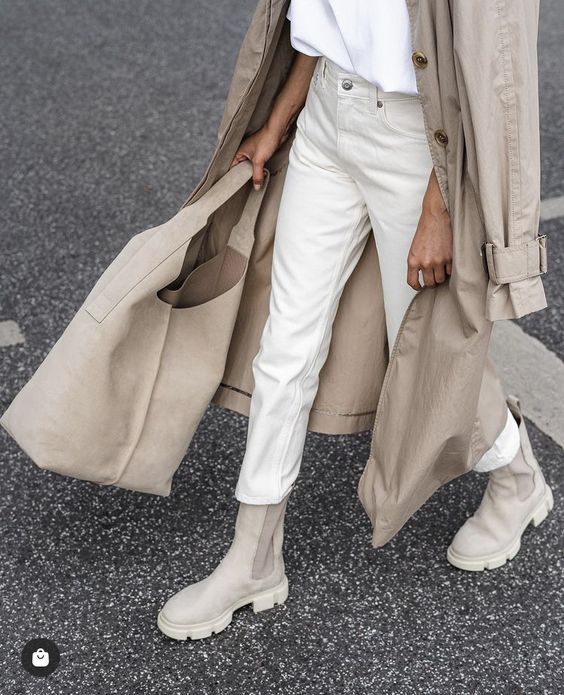a neutral fall look with a white t shirt, neutral jeans, nude Chelsea boots, a neutral trench and a neutral tote is wow