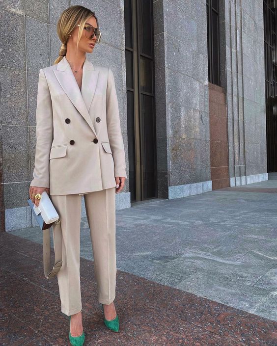 a pearl grey pantsuit, apple green shoes, a small and catchy tow tone box bag for a chic fall work look