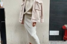 a pretty neutral outfit with a ribbed turtleneck, a creamy pencil skirt, white booties and a neutral teddy jacket