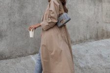 blue jeans, a beige trench, creamy Chelsea boots and a ligth blue bag for a cool fall look