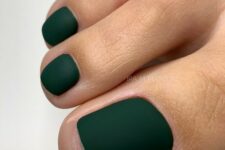 11 a matte dark green pedicure is a chic and stylish idea for the fall, and such a color is great for winter, too