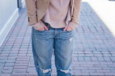 With blue distressed cuffed loose jeans and beige suede cutout heeled ankle boots