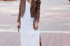 With oversized sunglasses, brown leather bag and beige leather ankle strap high heels