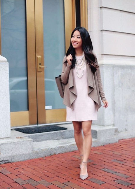 With pale pink mini dress, light gray ankle strap shoes, beige leather bag and white necklace