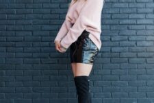 With pale pink oversized sweater, white bag and black suede over the knee boots