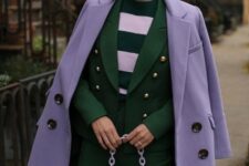 With sunglasses, emerald green and lilac striped sweater and lilac chain strap mini bag