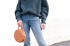 a chic fall look with a blue grey chunky knit sweater, blue mom jeans, white mules and a brown round bag