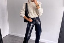 a white lapel sweater, black leather trousers, black chunky loafers and a black bag are a great idea for every day