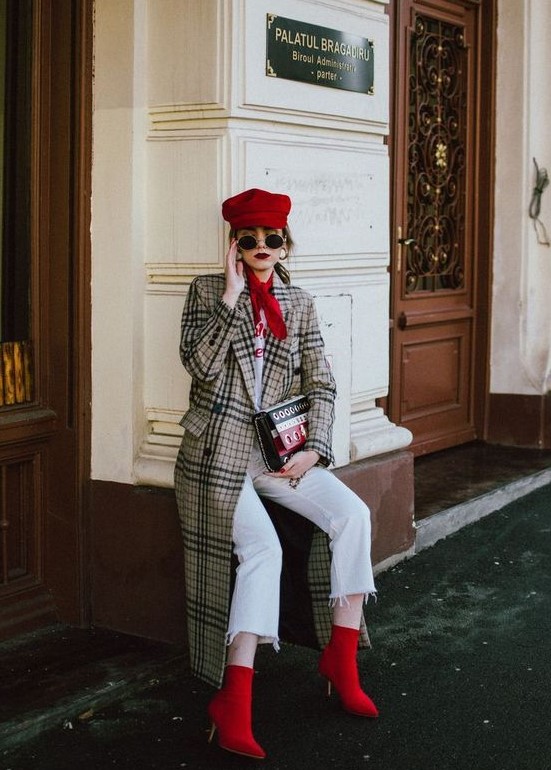 a white t-shirt, white jeans, red sock boots, a plaid midi coat and a hot red cap for a bold fall look
