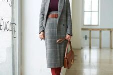 06 a sophisticated plaid grey skirt suit, a plum-colored turtleneck, a brown belt, burgundy boots and a brown bag