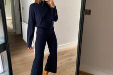 17 a beautiful Thanksgiving outfit with a navy turtleneck and cropped flare pants, amber-colored leather boots