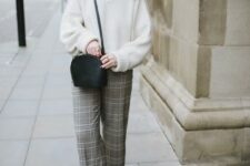 24 a fall to winter look with a white jumper, grey plaid wide leg trousers, black loafers and a black bag