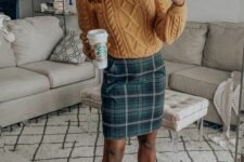 25 a yellow patterned sweater, a navy and green plaid skirt, brown boots are a cool fall work look