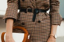 26 a beige plaid oversized blazer, a black belt, brown plaid trousers and a lovely two-tone bag