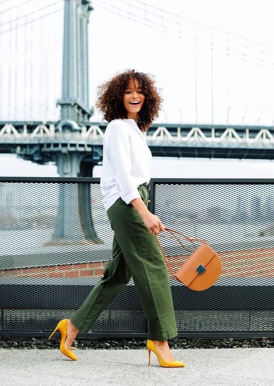 a white shirt, green oversized wideleg pants, yellow shoes and a camel bag for an outfit in fall colors