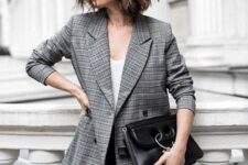 31 a grey plaid blazer, a white top and black pants can eb worn to work