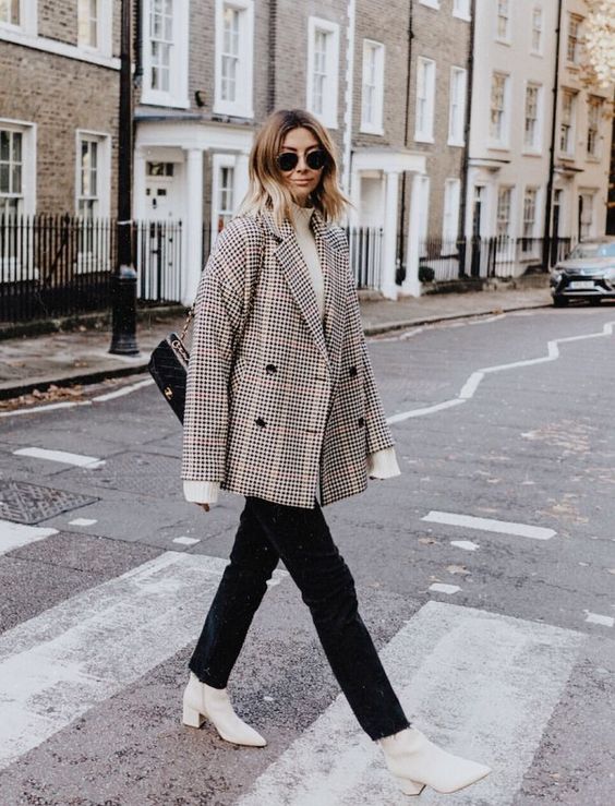 a white sweater and boots, black jeans and a bag, a grey plaid cropped coat are a great look for work