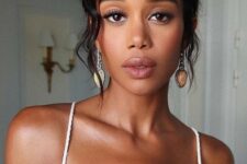 Laura Harrier rocking doe eye makeup with superbly curled lashes and smudged liner around the outer corners
