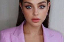 Odeya Rush rocking doe eye makeup with lashes galore, a bright waterline, and a slightly elongated outer corner