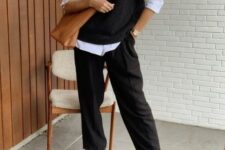 With black cropped loose trousers, brown leather tote bag and black leather mid calf heeled boots