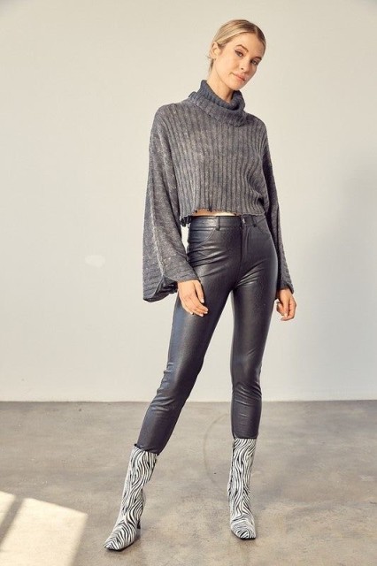 With black leather high-waisted skinny pants and black and white zebra printed mid calf heeled boots