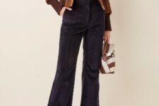 With brown and white leather bag, brown checked jacket and brown leather heeled boots