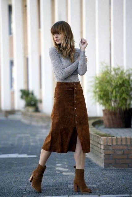 With brown suede heeled ankle boots