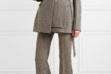 With checked belted long blazer, black clutch and white leather high heeled boots