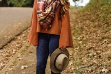 With checked scarf, blue flare jeans, beige and black wide brim hat and dark gray platform shoes