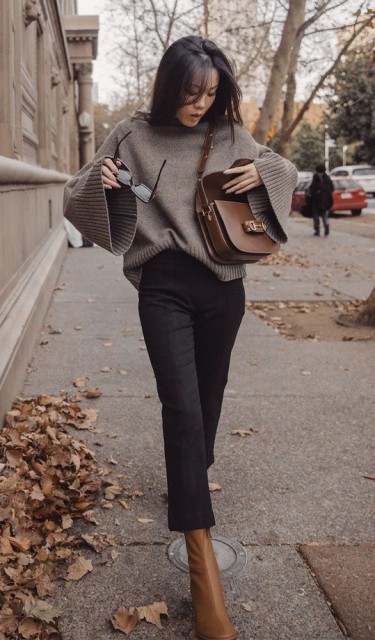 With dark brown leather bag and brown leather mid calf boots