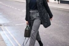 With gray tweed collarless coat, black suede mid calf boots and black leather bag