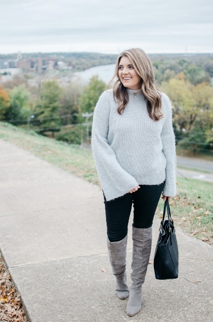 With skinny pants, gray suede over the knee boots and black leather tote bag