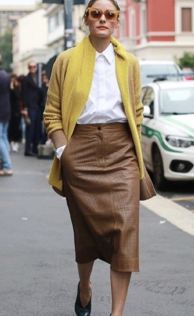 With sunglasses, mustard yellow long cardigan and emerald green leather shoes