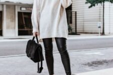 With white high heels and black suede bag