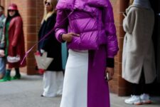 a beautiful cropped purple puffer jacket, a color block midi skirt, black sock boots are great for winter