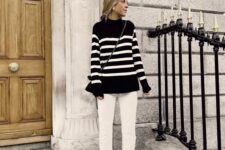 a black Breton stripe sweater, white jeans, black sneakers and a black bag are a nice combo for the fall