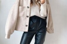a cozy fall look with leather trousers, a neutral ribbed jumper, a neutral flannel shirt coat and black heels
