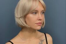 a pretty chin-length bob with curtain bangs and rounded ends looks stylish and lovely, it’s suitable for both thikc and fine hair